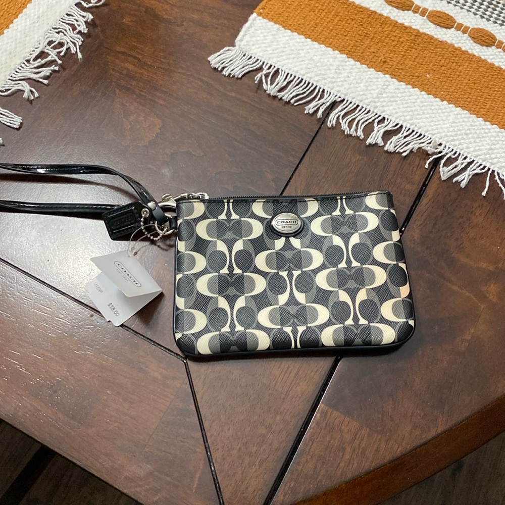 Coach vintage black, gray & white wristlet. With original price tag.